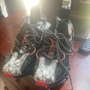 Red and Black Athletic Sneakers with Sporty Design